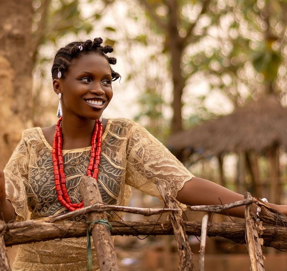 Vibrant Nigerian cultural celebration with traditional attire and music